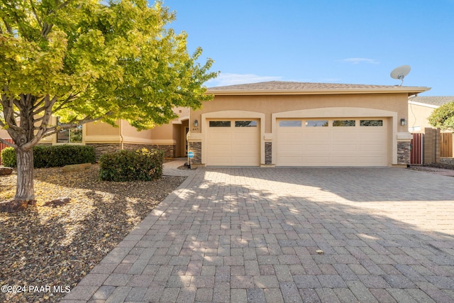 view of front of property featuring a garage