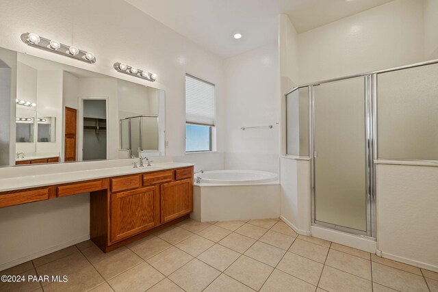 bathroom featuring separate shower and tub, tile patterned floors, and vanity