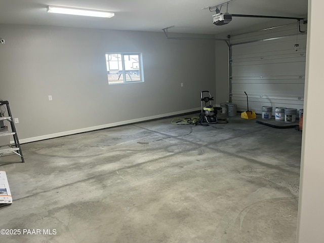 9901 E Arrowhead Dr Unit 20, Prescott Valley, AZ 86314 - garage featuring a garage door opener and baseboards