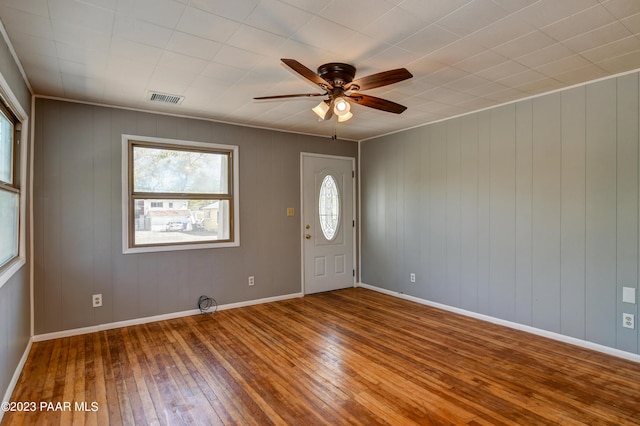 foyer with hardwood / wood-style flooring and ceiling fan