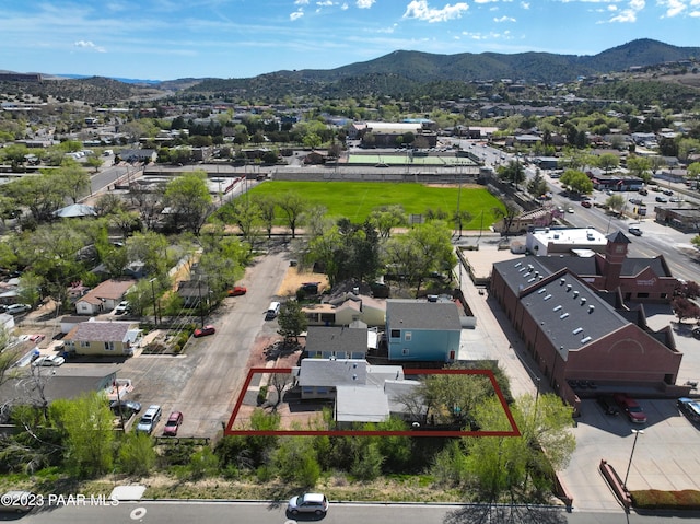 birds eye view of property featuring a mountain view