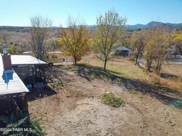 12995 E Main St, Dewey-Humboldt, AZ 86329 - view of yard with a mountain view and a dock