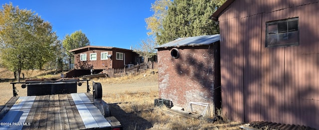 12995 E Main St, Dewey-Humboldt, AZ 86329 - view of home's exterior with a metal roof
