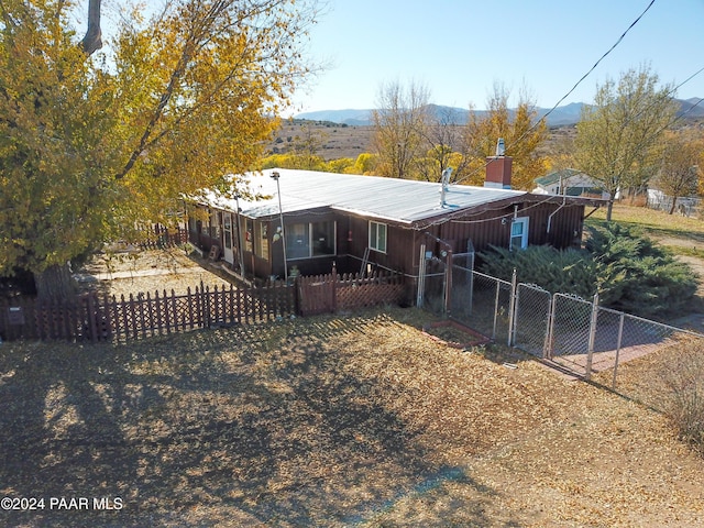 12995 E Main St, Dewey-Humboldt, AZ 86329 - view of front of property with a fenced front yard and a mountain view