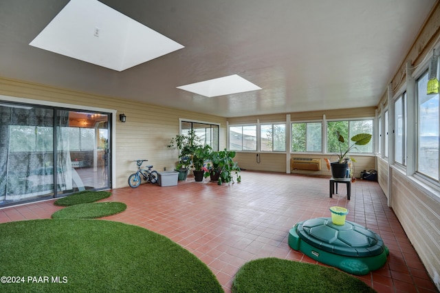 sunroom featuring a skylight