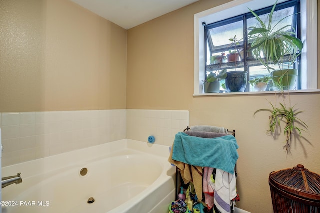 bathroom featuring a tub