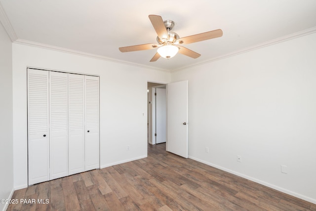 1703 Thunderbird Cir, Prescott, AZ 86303 - unfurnished bedroom featuring ornamental molding, wood finished floors, baseboards, a closet, and ceiling fan