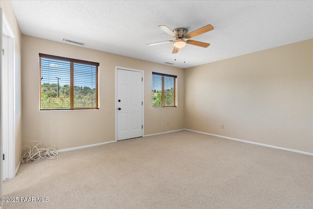 416 Hillcrest Dr, Prescott, AZ 86303 - unfurnished room featuring ceiling fan, carpet flooring, baseboards, and a textured ceiling