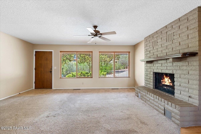 416 Hillcrest Dr, Prescott, AZ 86303 - unfurnished living room featuring a brick fireplace, ceiling fan, carpet, a textured ceiling, and baseboards