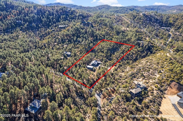 1700 S Sheriffs Posse Trl, Prescott, AZ 86303 - drone / aerial view with a mountain view and a wooded view