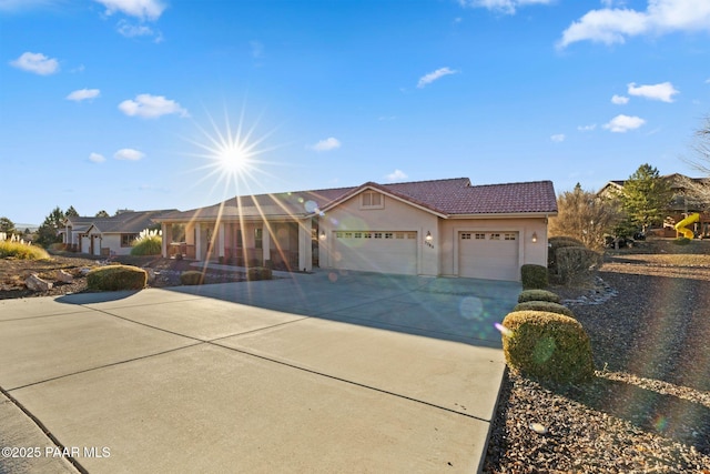 view of front of property featuring a garage