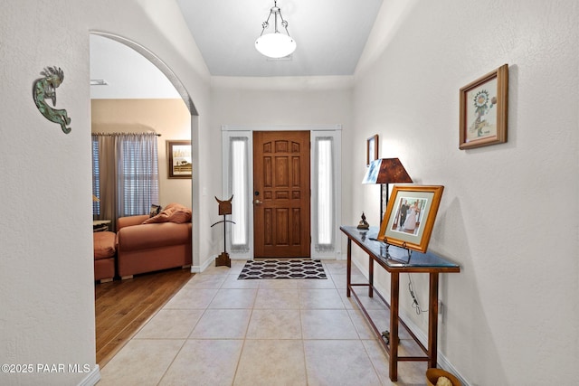 entrance foyer with light tile patterned flooring