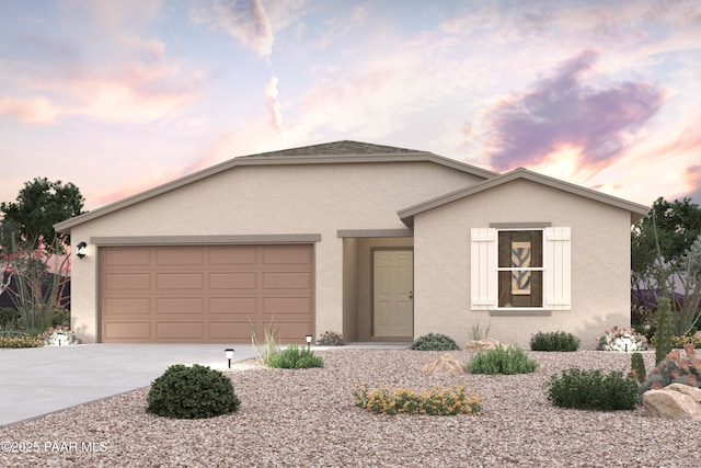 6940 N Wise Maverick Dr, Prescott Valley, AZ 86315 - view of front of home featuring stucco siding, driveway, and a garage