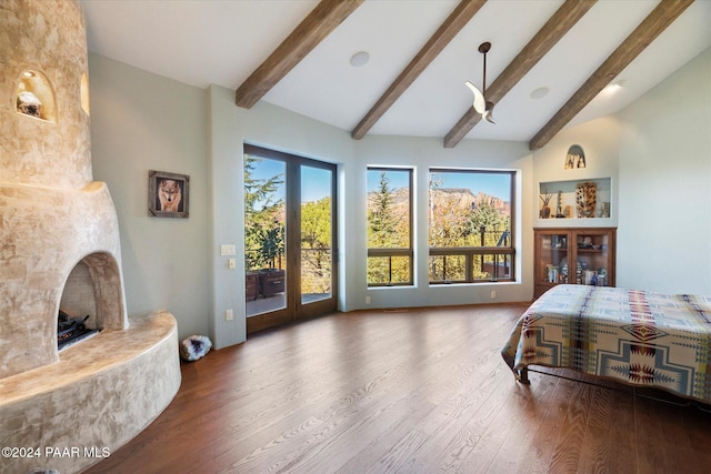 bedroom featuring beamed ceiling, high vaulted ceiling, wood-type flooring, and access to outside