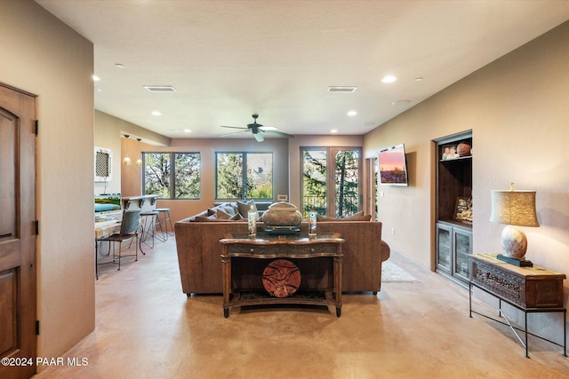 living room with ceiling fan