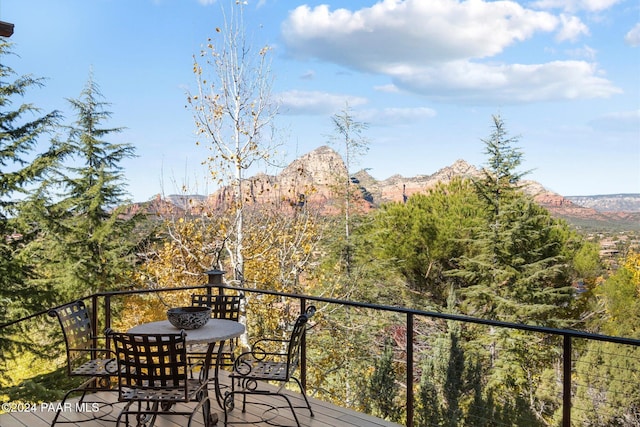 balcony featuring a mountain view