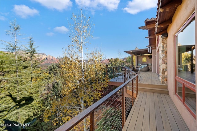 balcony featuring a mountain view