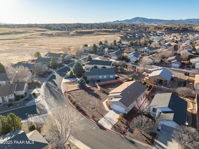 drone / aerial view featuring a mountain view