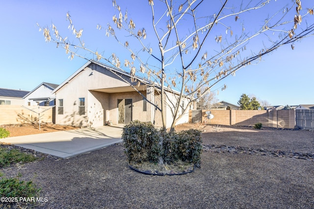 rear view of property with a patio