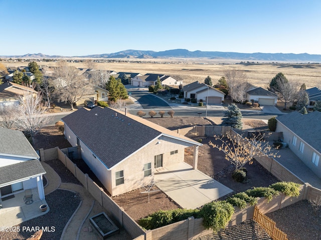 drone / aerial view featuring a mountain view