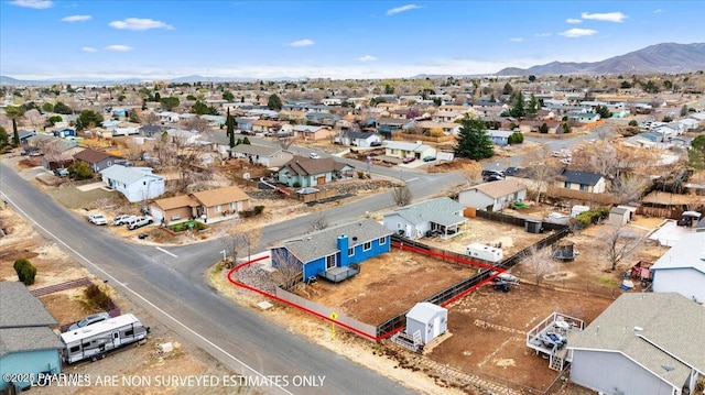 bird's eye view featuring a mountain view and a residential view