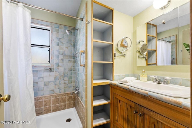 bathroom with vanity and curtained shower