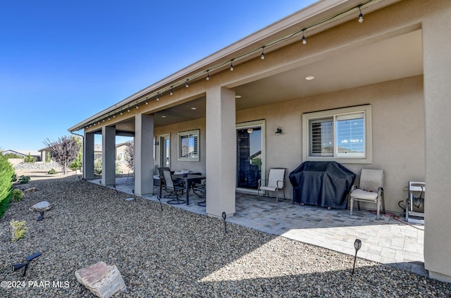 view of patio / terrace featuring a grill