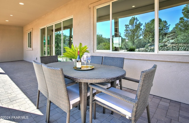 view of patio with outdoor dining area