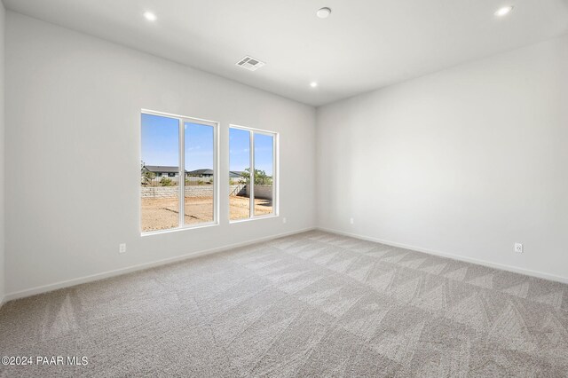 empty room with light carpet