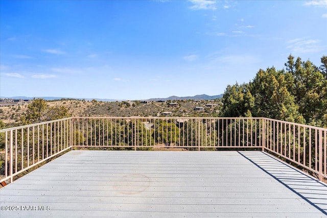 wooden terrace with a mountain view