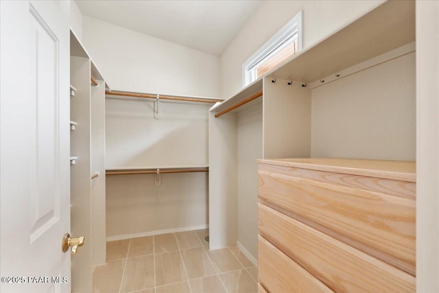 walk in closet featuring tile patterned floors