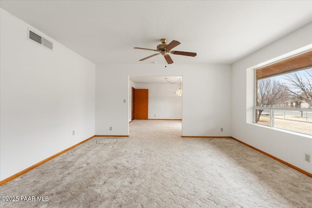 185 W Hereford Dr, Camp Verde, AZ 86322 - carpeted empty room featuring baseboards, ceiling fan, and a chandelier