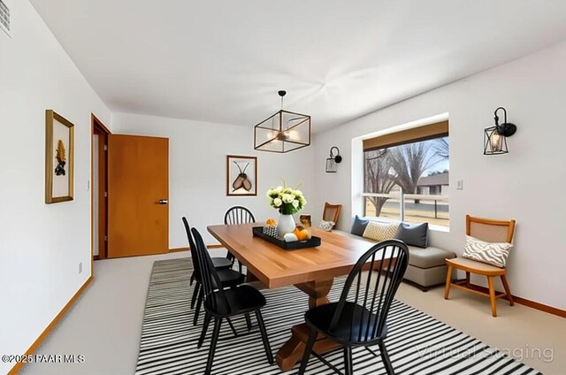 185 W Hereford Dr, Camp Verde, AZ 86322 - dining room featuring a chandelier and baseboards