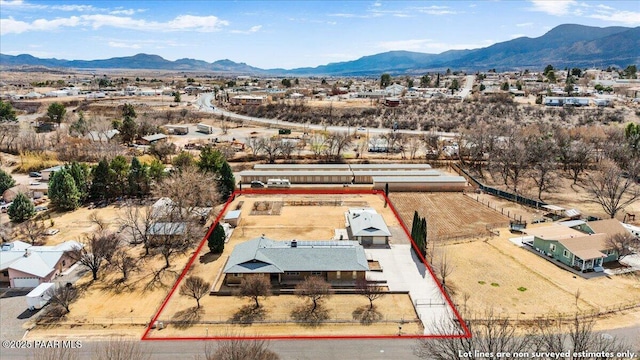 185 W Hereford Dr, Camp Verde, AZ 86322 - aerial view of property and surrounding area with property boundaries highlighted and mountains