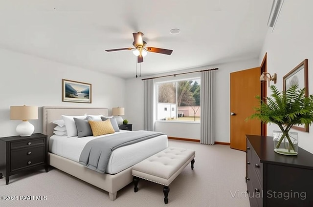 185 W Hereford Dr, Camp Verde, AZ 86322 - bedroom featuring light colored carpet, baseboards, and a ceiling fan