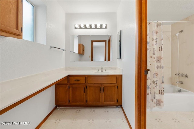 185 W Hereford Dr, Camp Verde, AZ 86322 - full bath with tile patterned floors, shower / bath combo, vanity, and baseboards