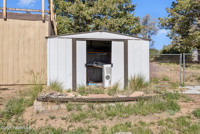 2615 W Red Tail Way, Prescott, AZ 86305 - view of shed with fence and ac unit
