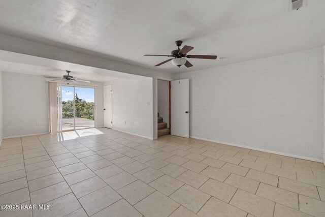 2615 W Red Tail Way, Prescott, AZ 86305 - unfurnished room with a ceiling fan, baseboards, stairs, and light tile patterned floors