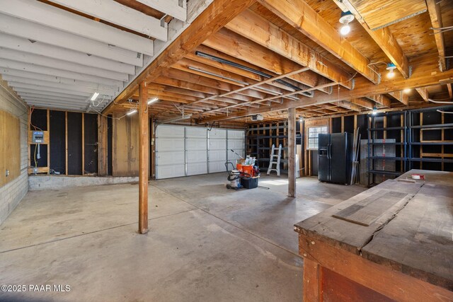 2615 W Red Tail Way, Prescott, AZ 86305 - garage with black fridge with ice dispenser
