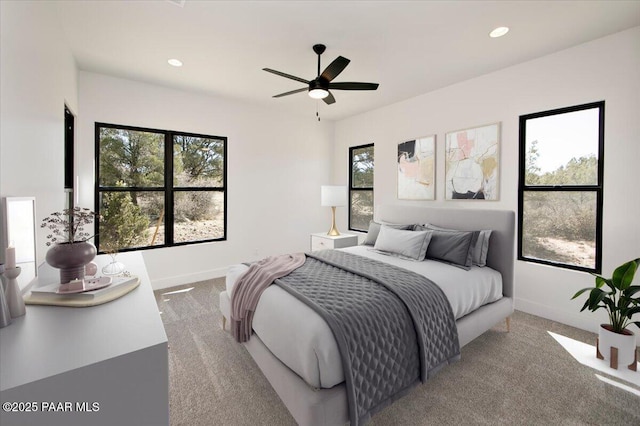 bedroom featuring recessed lighting, carpet floors, and baseboards