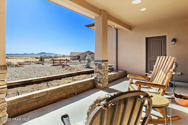 view of patio featuring a mountain view
