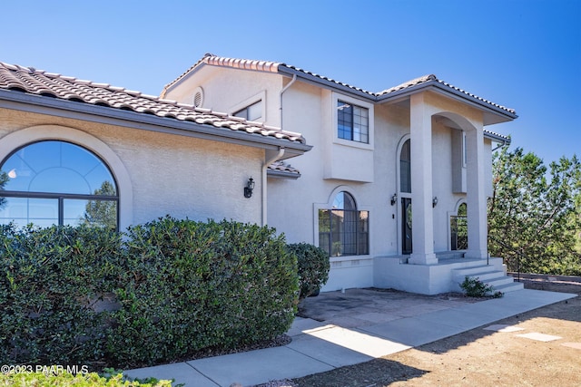 view of front of home featuring a patio