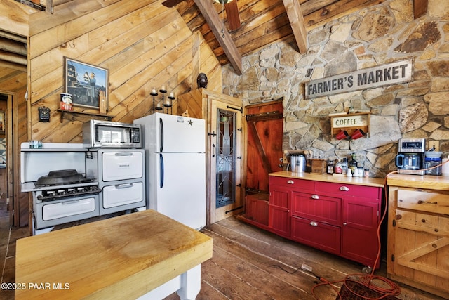 4555 E Combination Ln, Prescott, AZ 86303 - kitchen with stainless steel microwave, freestanding refrigerator, dark wood finished floors, wood ceiling, and wood walls