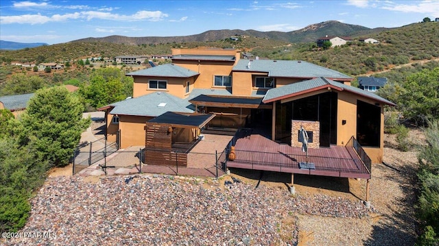 414 N Fitzmaurice Dr, Prescott, AZ 86303 - view of front of home with stone siding, stucco siding, and a mountain view