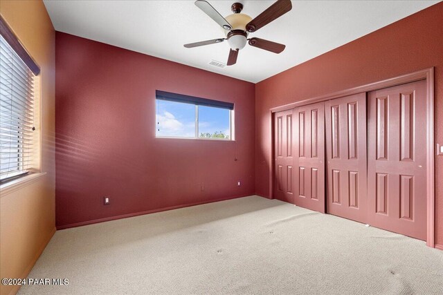 414 N Fitzmaurice Dr, Prescott, AZ 86303 - unfurnished bedroom featuring visible vents, a closet, ceiling fan, and carpet flooring