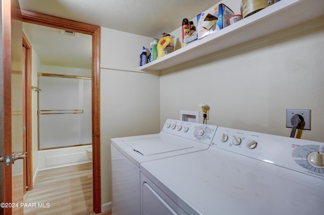 253 Creekside Cir Unit B, Prescott, AZ 86303 - laundry room with light wood-type flooring, visible vents, laundry area, and separate washer and dryer