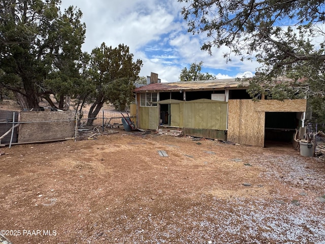 55409 Madre Cir, Seligman, AZ 86337 - back of house with an outbuilding