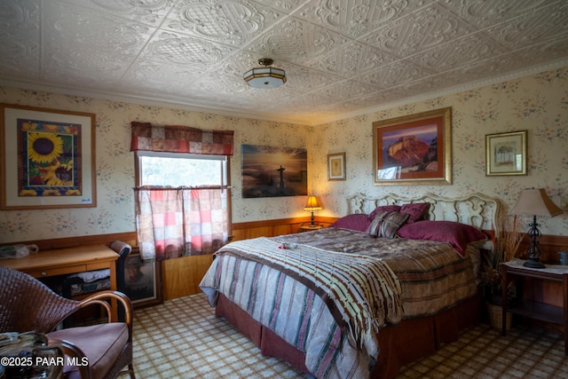 55409 Madre Cir, Seligman, AZ 86337 - bedroom featuring a wainscoted wall, an ornate ceiling, crown molding, and wooden walls