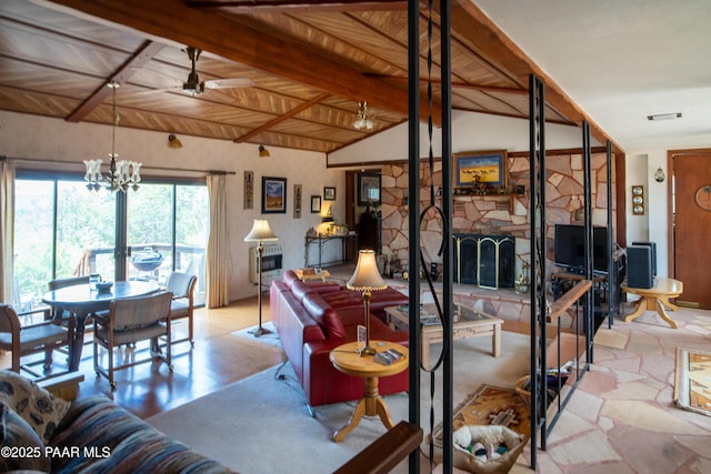 55409 Madre Cir, Seligman, AZ 86337 - living room with a fireplace, a chandelier, and ceiling fan