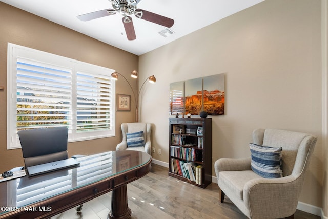 office area featuring ceiling fan and light hardwood / wood-style floors